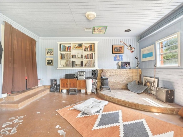 8622 Thunderbird Rd, Austin, TX 78736 - living room with concrete flooring and ornamental molding