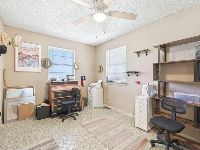 8622 Thunderbird Rd, Austin, TX 78736 - office featuring ceiling fan, a textured ceiling, and baseboards