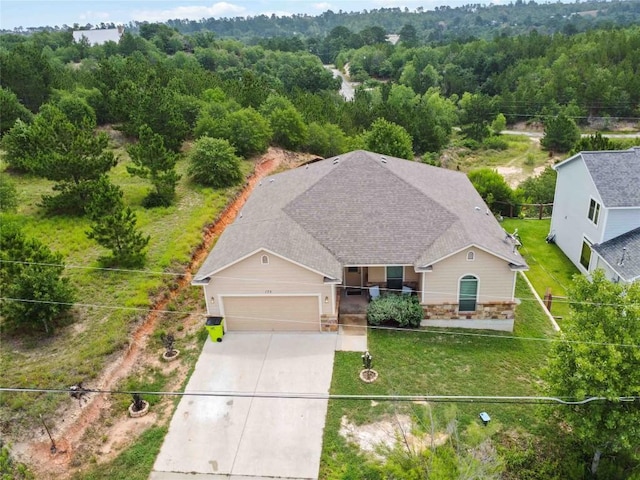 173 Kipahulu Dr, Bastrop, TX 78602 - aerial view of property and surrounding area with a forest