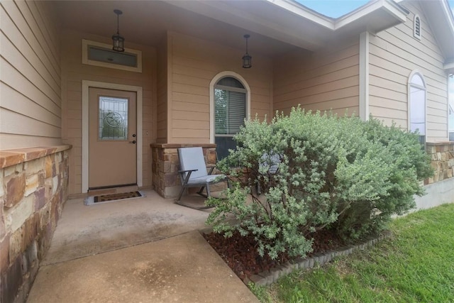173 Kipahulu Dr, Bastrop, TX 78602 - view of exterior entry featuring stone siding