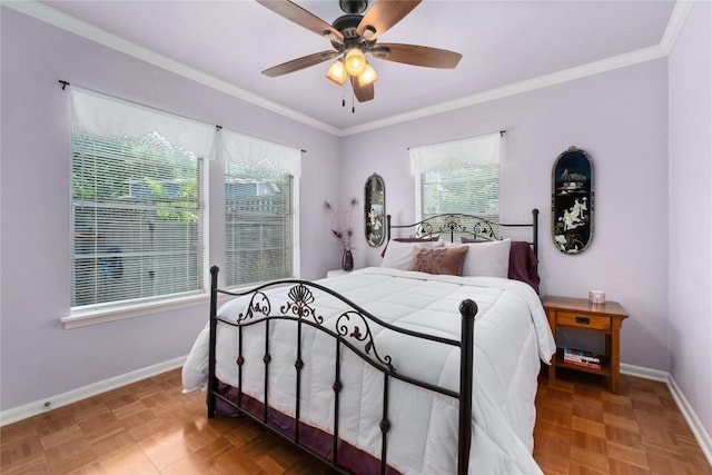 2301 Del Curto Rd, Austin, TX 78704 - bedroom with crown molding, baseboards, and a ceiling fan