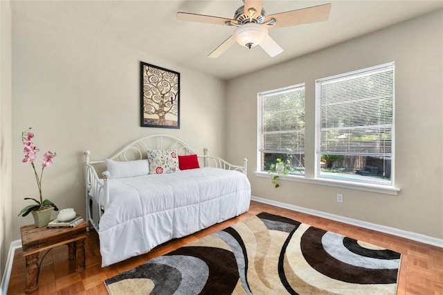 2301 Del Curto Rd, Austin, TX 78704 - bedroom featuring baseboards and a ceiling fan