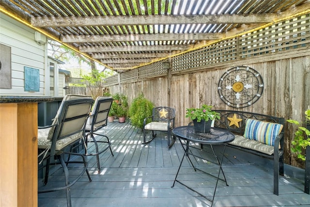2301 Del Curto Rd, Austin, TX 78704 - wooden deck featuring a fenced backyard and a pergola