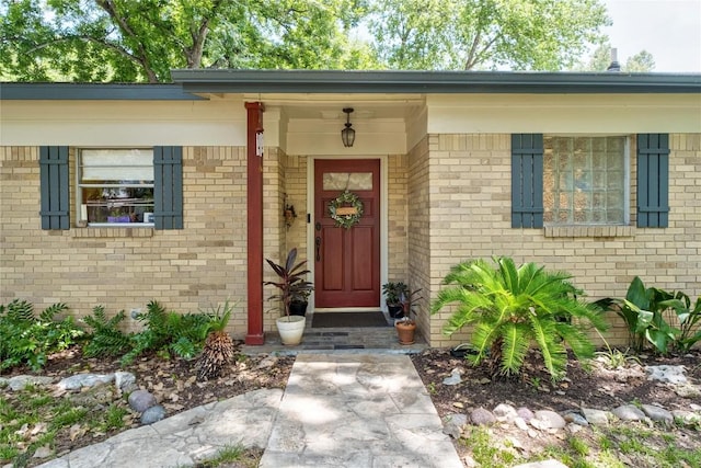 2301 Del Curto Rd, Austin, TX 78704 - doorway to property featuring brick siding