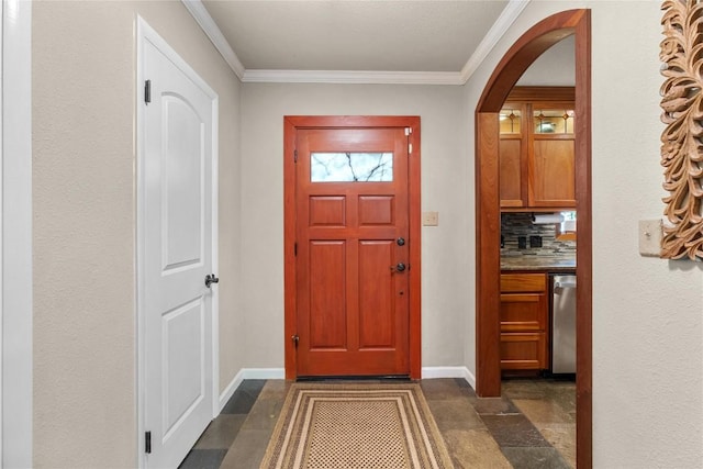 2301 Del Curto Rd, Austin, TX 78704 - foyer entrance featuring arched walkways, stone tile flooring, baseboards, and crown molding