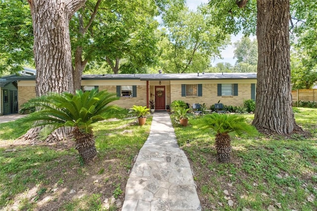 2301 Del Curto Rd, Austin, TX 78704 - single story home with brick siding