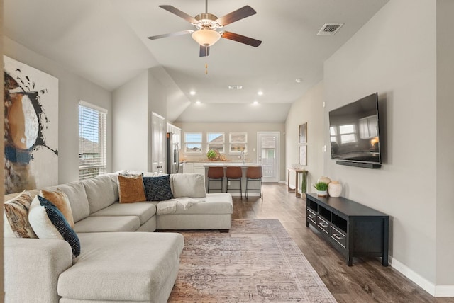 1910 Lummus Dr, Temple, TX 76504 - living area with dark wood finished floors, a ceiling fan, baseboards, recessed lighting, and vaulted ceiling