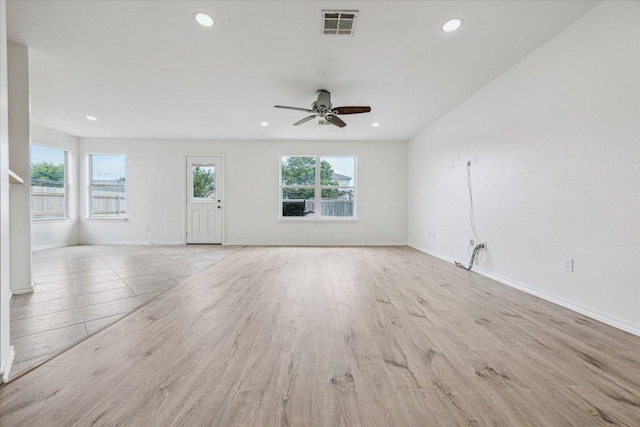 110 Rinehardt St, Hutto, TX 78634 - unfurnished living room featuring recessed lighting, a ceiling fan, baseboards, and light wood-style flooring