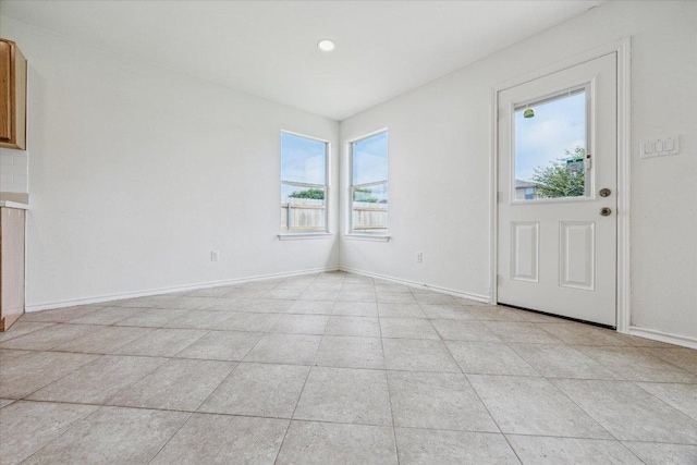 110 Rinehardt St, Hutto, TX 78634 - entrance foyer featuring light tile patterned flooring and baseboards