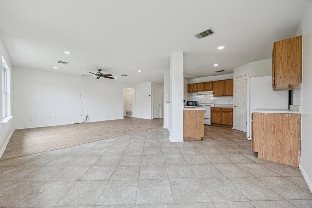 110 Rinehardt St, Hutto, TX 78634 - unfurnished living room featuring recessed lighting, a ceiling fan, and baseboards