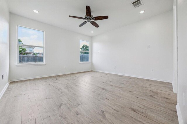 110 Rinehardt St, Hutto, TX 78634 - unfurnished room featuring wood finished floors, a ceiling fan, baseboards, and recessed lighting
