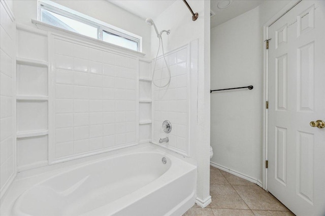 110 Rinehardt St, Hutto, TX 78634 - full bathroom with toilet, shower / washtub combination, tile patterned flooring, and baseboards
