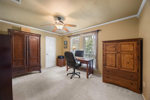 13210 Dime Box Trl, Austin, TX 78729 - home office featuring light colored carpet, ornamental molding, a ceiling fan, baseboards, and a textured ceiling