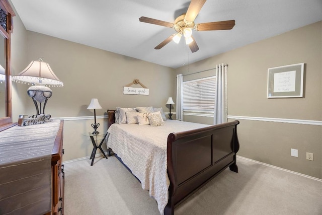 13210 Dime Box Trl, Austin, TX 78729 - carpeted bedroom with baseboards and a ceiling fan