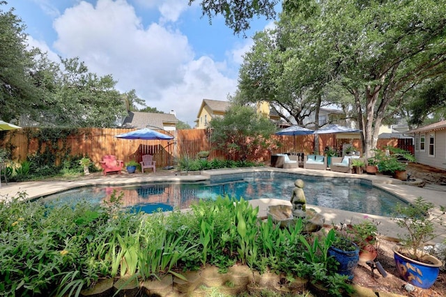 13210 Dime Box Trl, Austin, TX 78729 - view of swimming pool featuring a fenced backyard