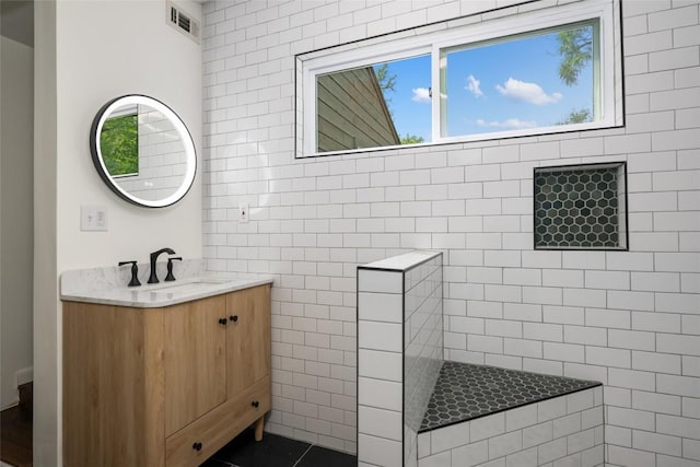 5902 Tumbling Cir, Austin, TX 78731 - full bath with vanity and a walk in shower