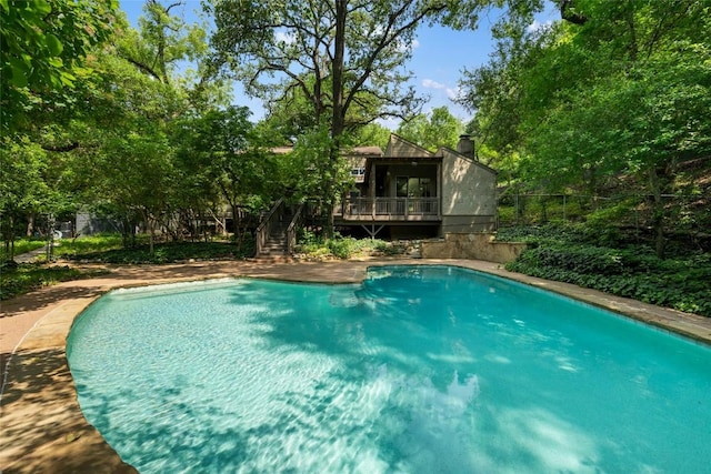5902 Tumbling Cir, Austin, TX 78731 - outdoor pool featuring stairs and a deck