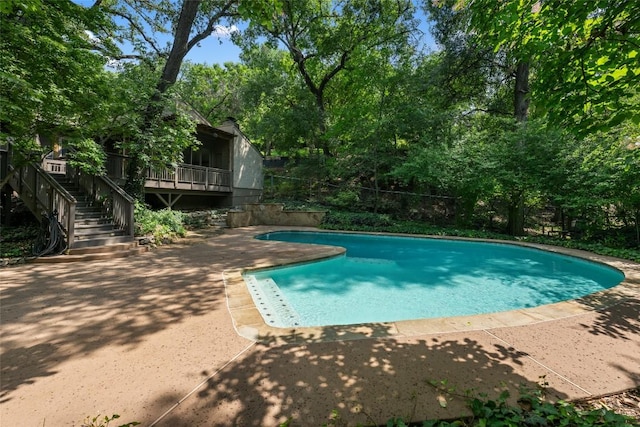 5902 Tumbling Cir, Austin, TX 78731 - swimming pool featuring a patio area, stairs, and view of wooded area