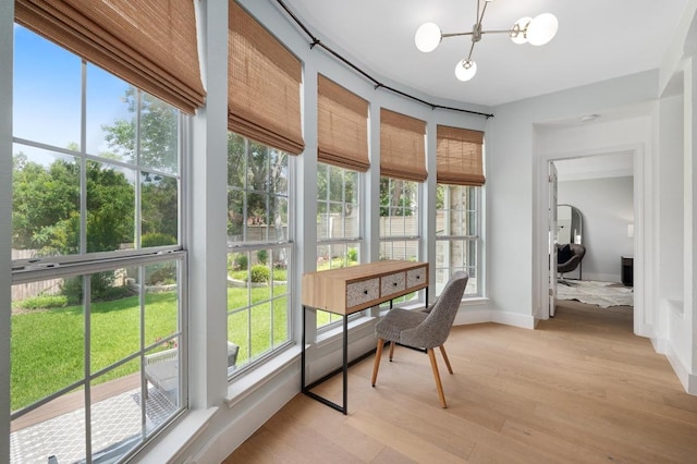 10239 Scull Creek Dr, Austin, TX 78730 - sunroom / solarium with a chandelier and healthy amount of natural light