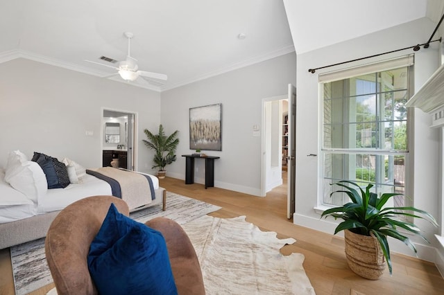 10239 Scull Creek Dr, Austin, TX 78730 - bedroom with ornamental molding, wood finished floors, ensuite bath, and a ceiling fan