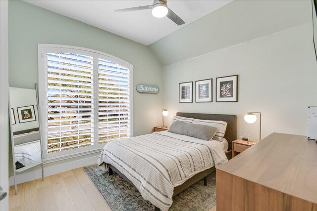 10239 Scull Creek Dr, Austin, TX 78730 - bedroom featuring vaulted ceiling, wood finished floors, and ceiling fan