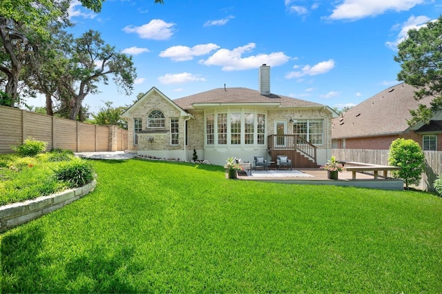 10239 Scull Creek Dr, Austin, TX 78730 - rear view of house featuring a chimney, a fenced backyard, and a patio area