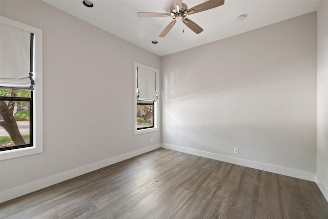 3604 Shady Creek Cv, Austin, TX 78746 - spare room featuring wood finished floors, baseboards, and ceiling fan