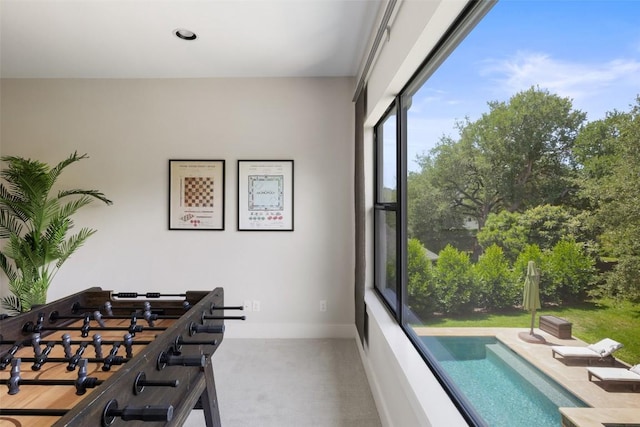 3604 Shady Creek Cv, Austin, TX 78746 - rec room with baseboards and carpet flooring