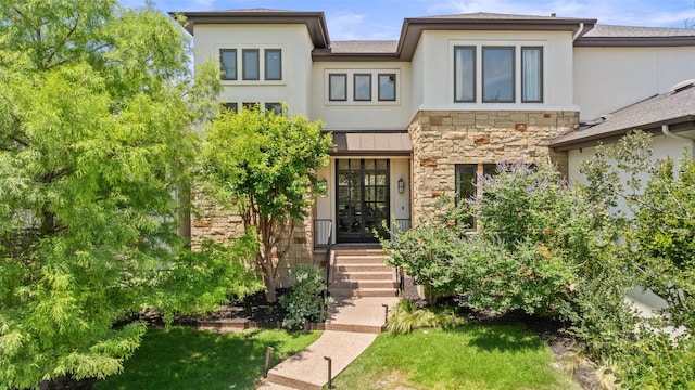 3604 Shady Creek Cv, Austin, TX 78746 - view of front facade with stone siding and stucco siding