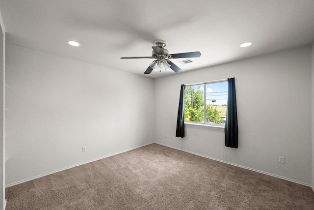 122 Retama Dr, Georgetown, TX 78626 - carpeted empty room featuring a ceiling fan, recessed lighting, and baseboards