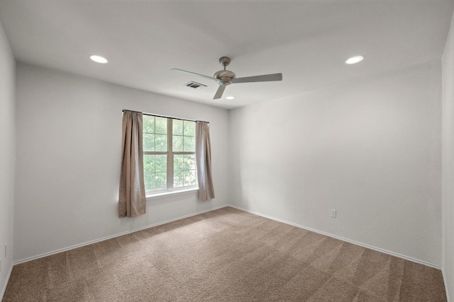 122 Retama Dr, Georgetown, TX 78626 - carpeted empty room featuring a ceiling fan, recessed lighting, and baseboards