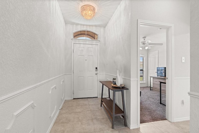 609 Ibis Falls Loop, Jarrell, TX 76537 - foyer featuring light tile patterned floors and a ceiling fan