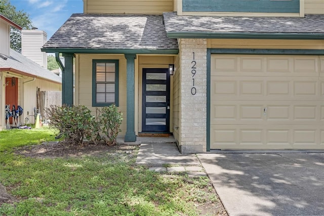 12910 Steeple Chase Dr, Austin, TX 78729 - view of exterior entry with roof with shingles and driveway