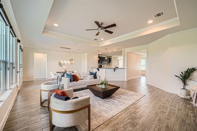 318 Fairway Ridge Rd, Georgetown, TX 78633 - living area featuring a tray ceiling, light wood-style floors, a ceiling fan, baseboards, and recessed lighting