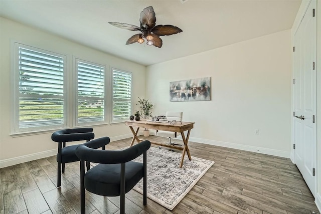 318 Fairway Ridge Rd, Georgetown, TX 78633 - home office with wood finished floors, baseboards, and a ceiling fan