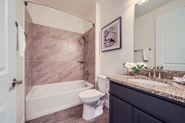 318 Fairway Ridge Rd, Georgetown, TX 78633 - bathroom with toilet, vanity, bathing tub / shower combination, and wood finished floors