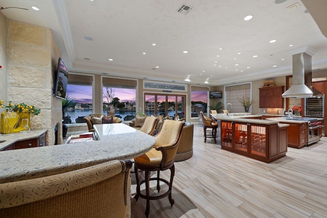 101 Matern Ct, Horseshoe Bay, TX 78657 - dining area featuring ornamental molding, recessed lighting, and light wood-style floors