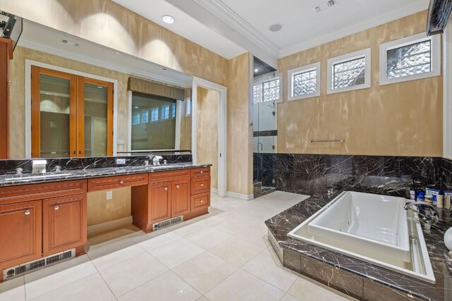 101 Matern Ct, Horseshoe Bay, TX 78657 - full bath featuring double vanity, a whirlpool tub, a shower stall, crown molding, and tile patterned flooring