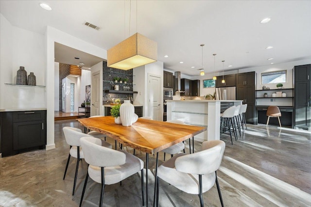 133 Frederick St Unit A, Austin, TX 78704 - dining room featuring finished concrete floors and recessed lighting