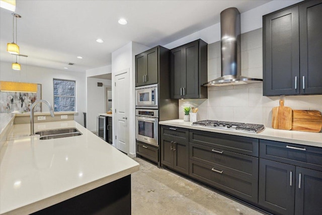 133 Frederick St Unit A, Austin, TX 78704 - kitchen with appliances with stainless steel finishes, wall chimney exhaust hood, light countertops, decorative backsplash, and recessed lighting
