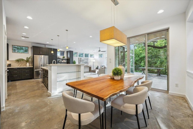 133 Frederick St Unit A, Austin, TX 78704 - dining space with finished concrete flooring, recessed lighting, healthy amount of natural light, and ceiling fan
