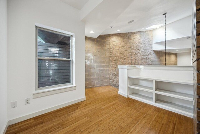 133 Frederick St Unit A, Austin, TX 78704 - unfurnished room with wood finished floors and baseboards