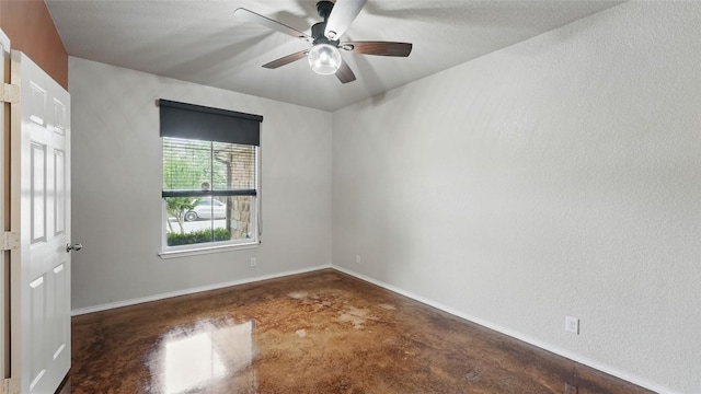 878 Avery Pkwy, New Braunfels, TX 78130 - empty room with concrete floors, a ceiling fan, and baseboards