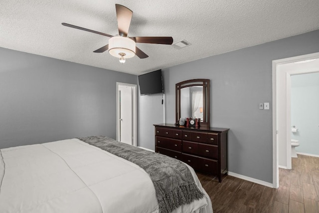 4019 Iriona Bnd, Austin, TX 78749 - bedroom with dark wood-type flooring, a textured ceiling, and a ceiling fan