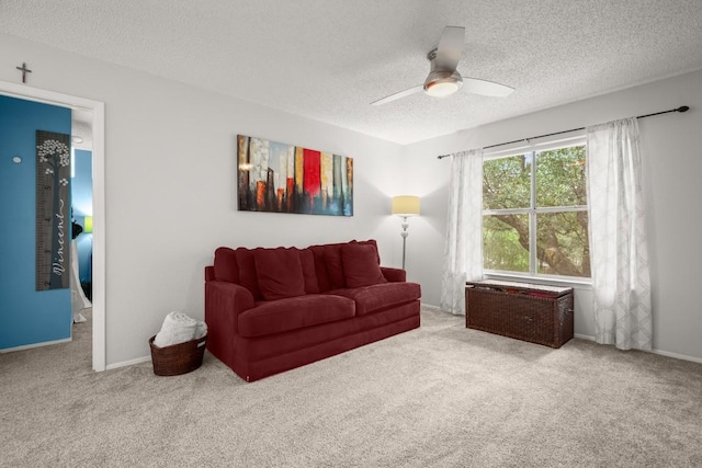 4019 Iriona Bnd, Austin, TX 78749 - living room featuring a textured ceiling, carpet floors, and ceiling fan