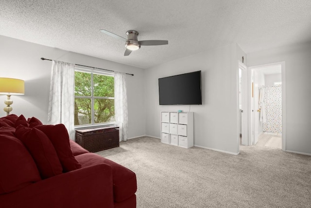 4019 Iriona Bnd, Austin, TX 78749 - carpeted living room with a ceiling fan and a textured ceiling