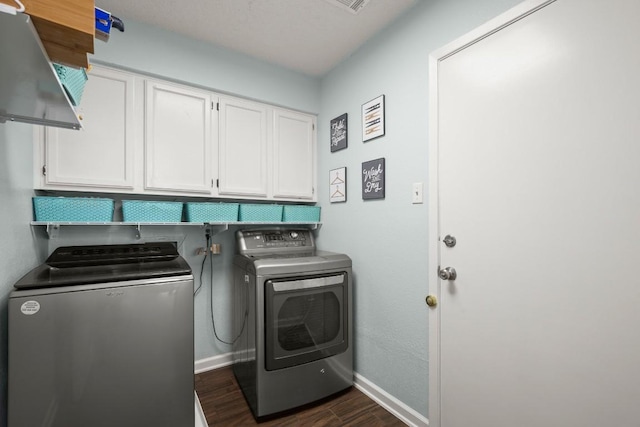 4019 Iriona Bnd, Austin, TX 78749 - laundry area with cabinet space, independent washer and dryer, and dark wood-style flooring