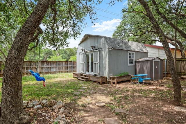 4019 Iriona Bnd, Austin, TX 78749 - fenced backyard with a storage unit