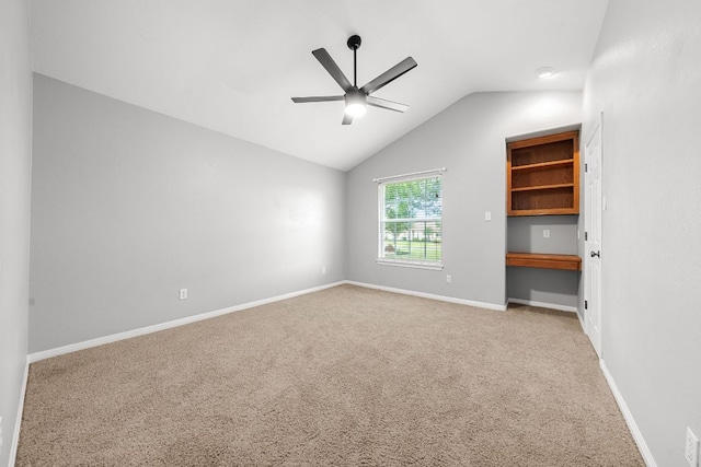 110 Starlight Trl, Georgetown, TX 78633 - unfurnished bedroom featuring carpet, vaulted ceiling, baseboards, and ceiling fan