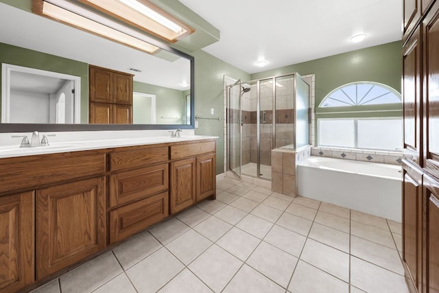 110 Starlight Trl, Georgetown, TX 78633 - full bathroom with tile patterned flooring, a shower stall, double vanity, and a bath